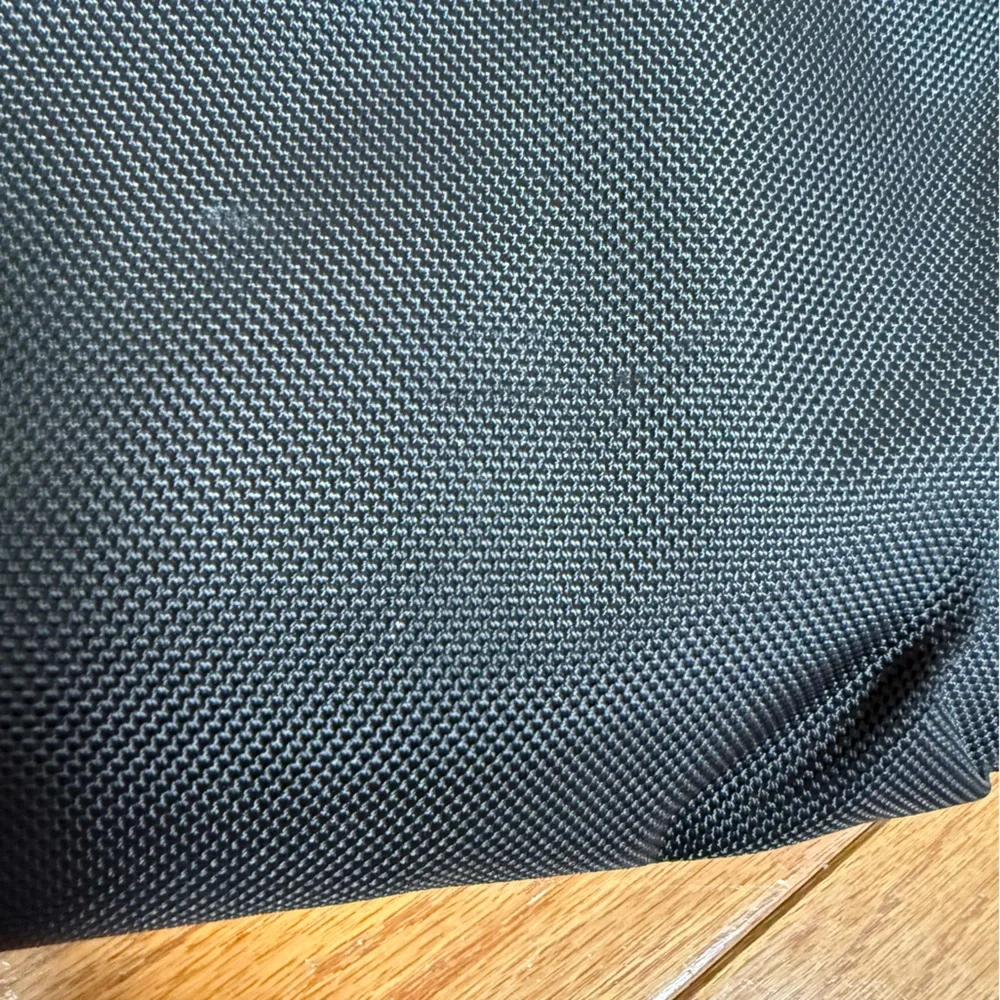 Tumi Black Duffel Bag with Adjustable Shoulder Strap